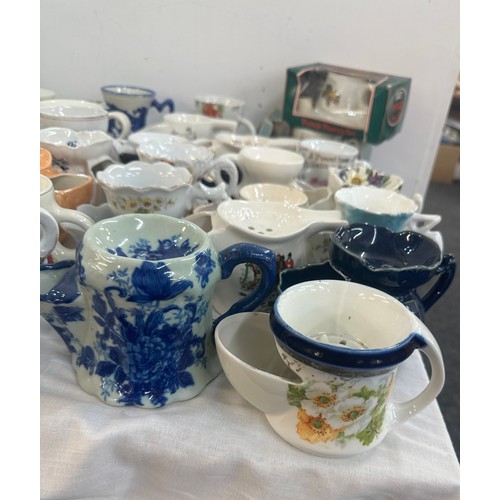 128 - A large collection of porcelain shaving mugs various makers and designs