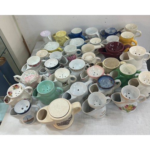 131 - A large collection of porcelain shaving mugs various makers and designs