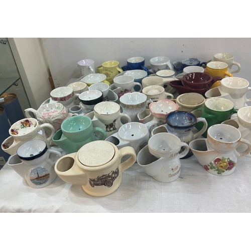 131 - A large collection of porcelain shaving mugs various makers and designs