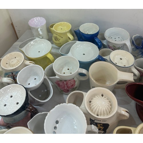 131 - A large collection of porcelain shaving mugs various makers and designs