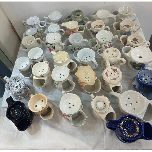 134 - A large collection of porcelain shaving mugs various makers and designs