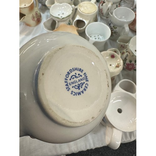 134 - A large collection of porcelain shaving mugs various makers and designs