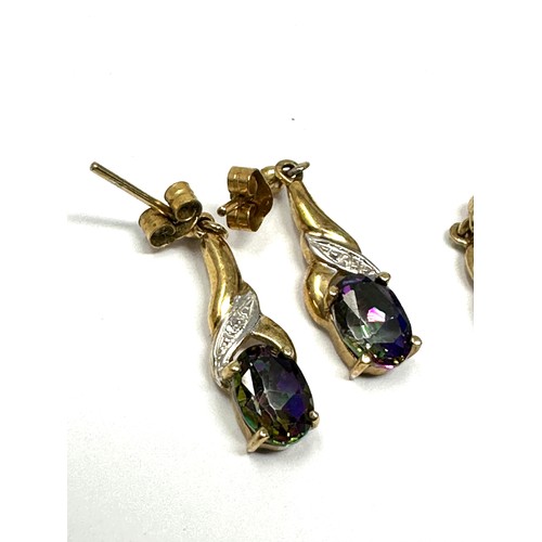 334 - 2 x 9ct gold diamond, mystic topaz & amethyst drop earrings (2.6g)