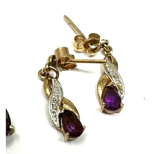 334 - 2 x 9ct gold diamond, mystic topaz & amethyst drop earrings (2.6g)