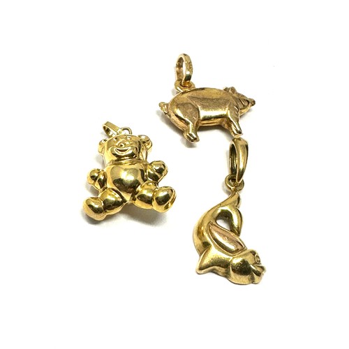 345 - 4 x 9ct gold animal pendants inc. bear, pig & fish (3.3g)