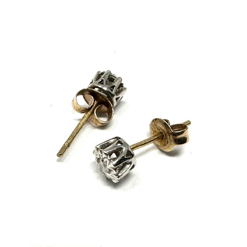 293 - 9ct gold diamond earrings (0.9g)