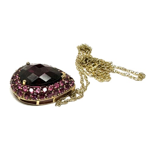 247 - 9ct gold garnet pendant necklace (6.6g)