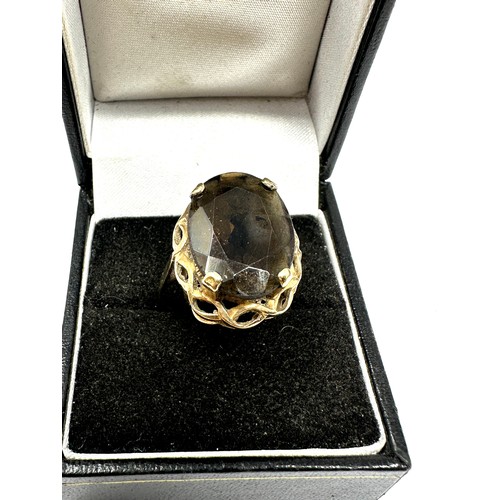 254 - 9ct gold smoky quartz cocktail ring (4.7g)