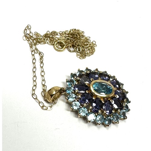 253 - 9ct gold topaz and aquamarine pendant necklace (3.2g)