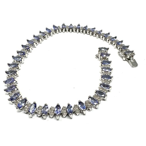 322 - 9ct white gold tanzanite & diamond bracelet  (10.8g)