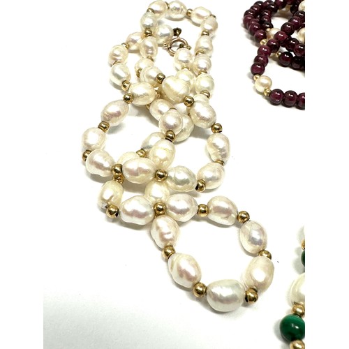 341 - 3 x 9ct gold cultured pearl, malachite & garnet single strand necklaces (35.5g)