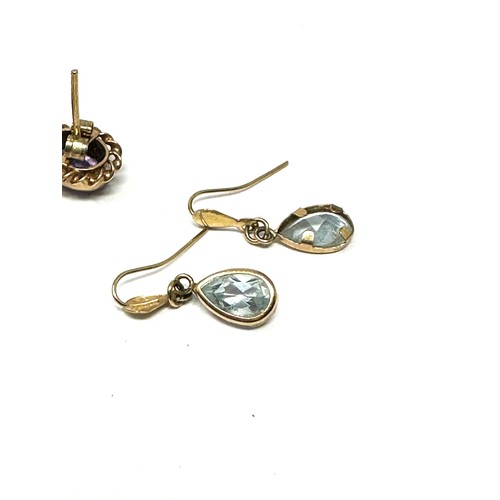 349 - 4 x 9ct gold blue topaz & amethyst earrings (4.6g)