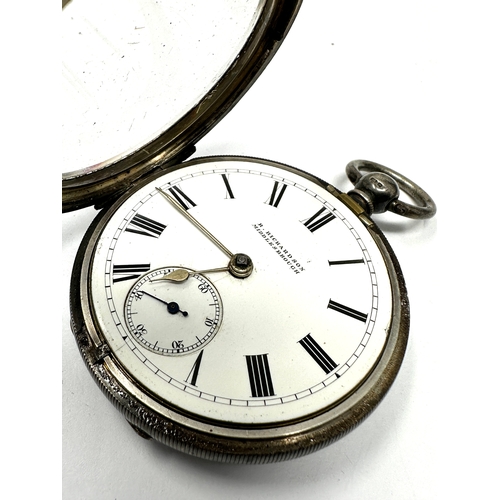 453 - Antique silver open face pocket watch the watch is ticking