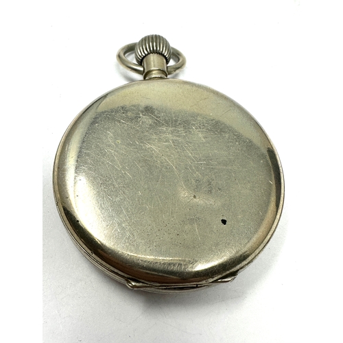 447 - Omega open face pocket watch nickel cased the watch is ticking