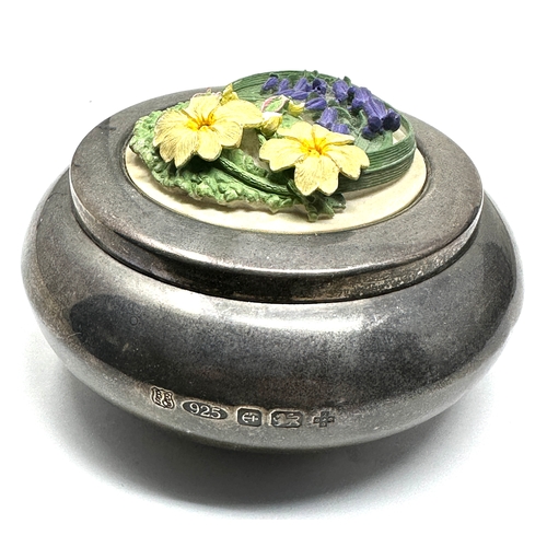 106 - 925 silver hallmarked lidded bowl with floral pottery insert measures approx 9cm dia chips to floral... 