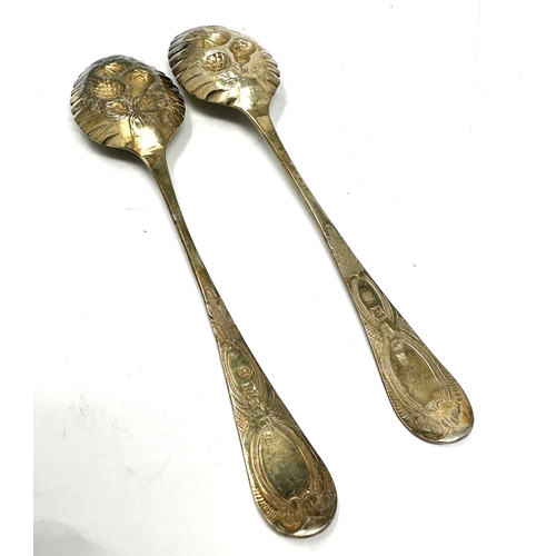 79 - 2 georgian silver berry spoons