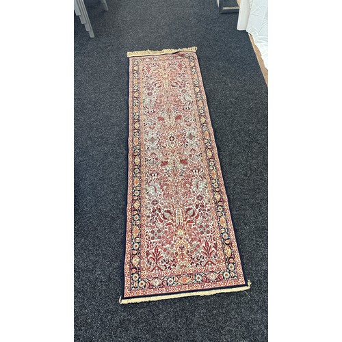 126 - Persian style rug runner measures approximately 82 inches by 24 inches