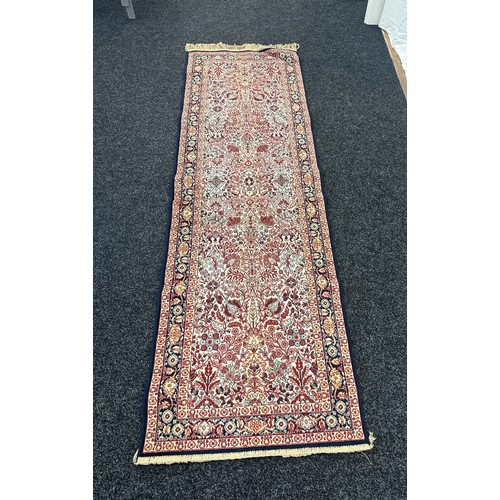 126 - Persian style rug runner measures approximately 82 inches by 24 inches