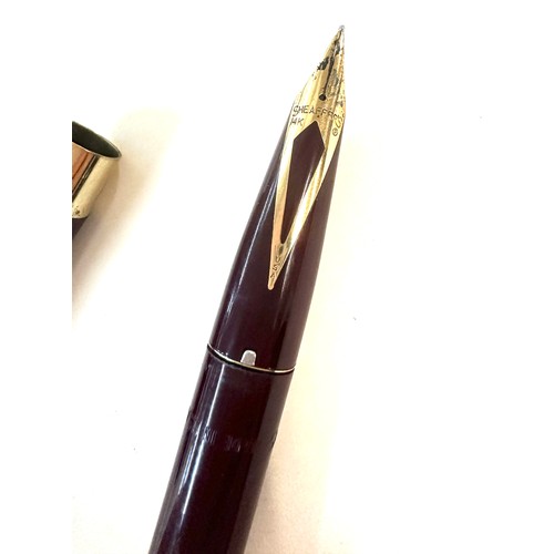 493 - Sheaffer triumph burgundy fountain pen with 14k nib. Made in USA. Clip is in over all good working o... 