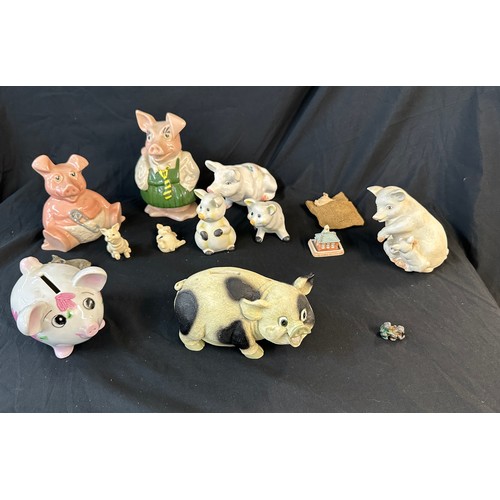 91 - Selection of collectable pigs includes money banks, small metal pig etc