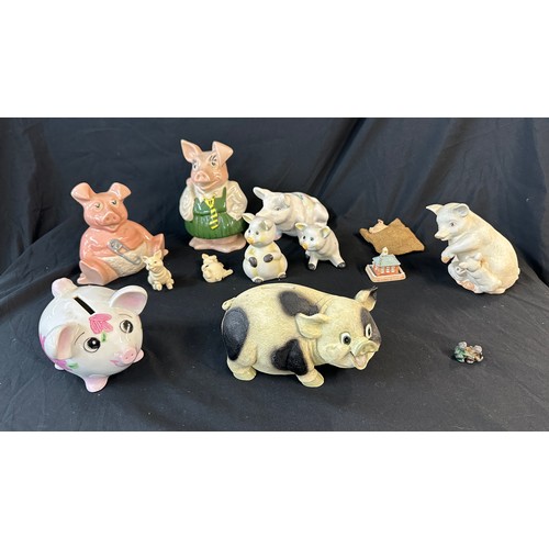 91 - Selection of collectable pigs includes money banks, small metal pig etc