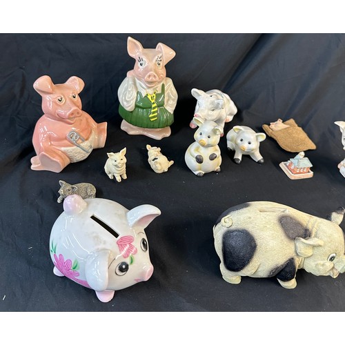 91 - Selection of collectable pigs includes money banks, small metal pig etc