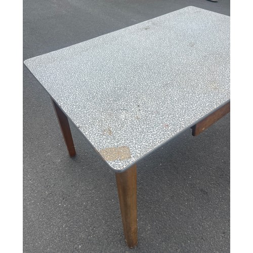 100M - 1960's dining table with drawer measures approximately 76 cm tall by 122 cm wide and 81 cm deep