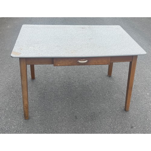 100M - 1960's dining table with drawer measures approximately 76 cm tall by 122 cm wide and 81 cm deep