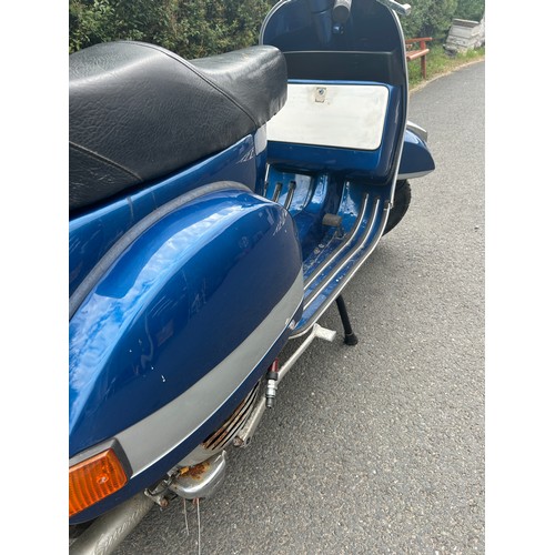 99A - 1983 petrol blue Vespa Douglas 125 scooter, in need of attention