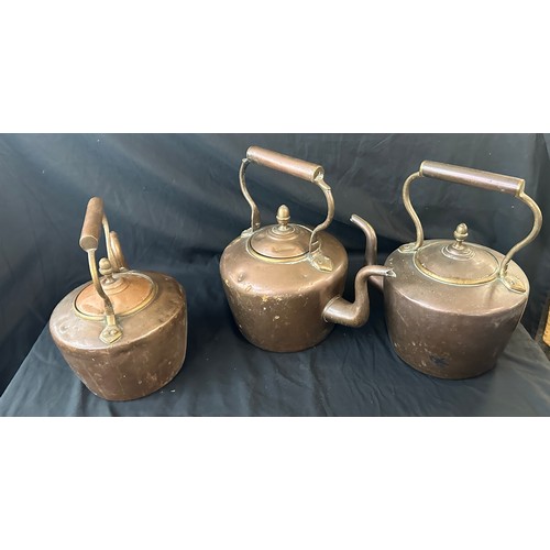 66 - Three vintage copper kettles