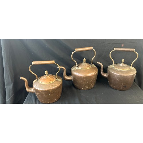 66 - Three vintage copper kettles