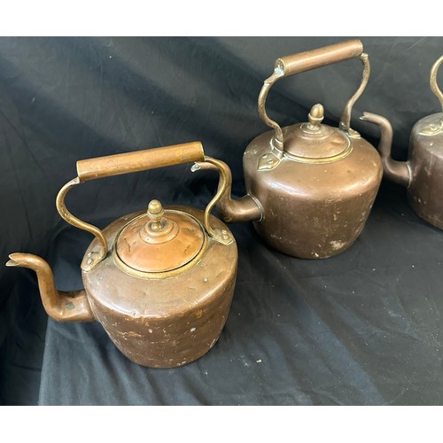 66 - Three vintage copper kettles