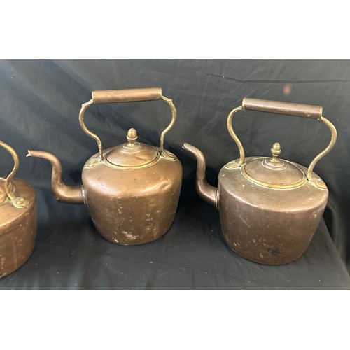 66 - Three vintage copper kettles