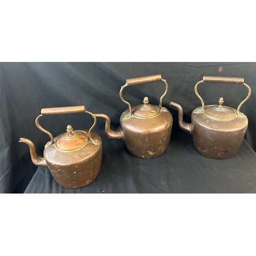 66 - Three vintage copper kettles