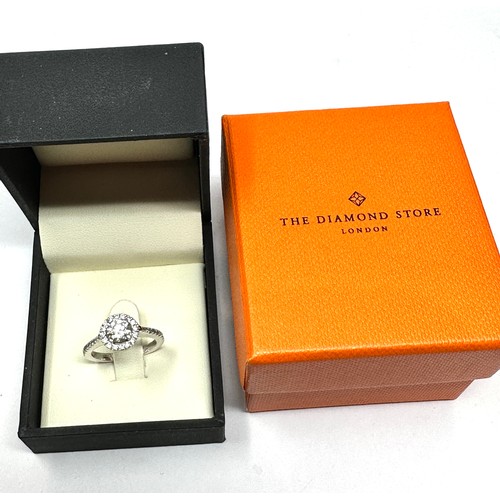 136 - 18ct white gold  diamond halo & diamond shoulders with central moissanite ring in the original box b... 