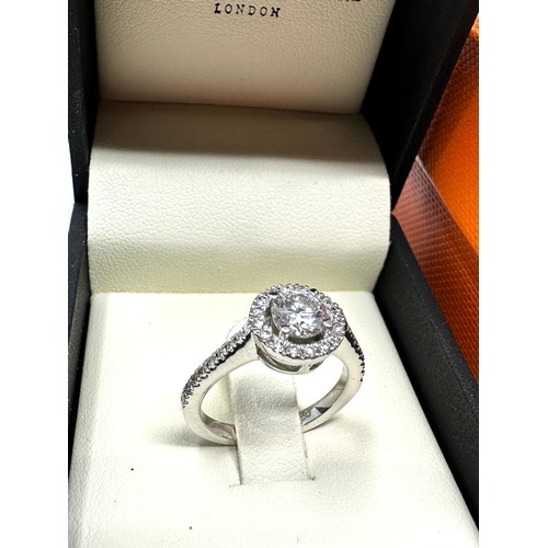 136 - 18ct white gold  diamond halo & diamond shoulders with central moissanite ring in the original box b... 