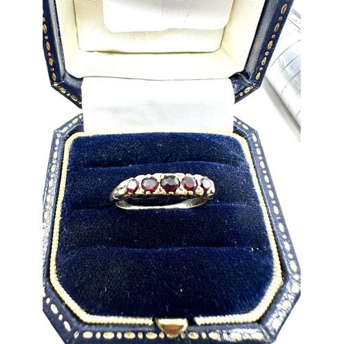 130 - 9ct gold garnet ring (2.6g)