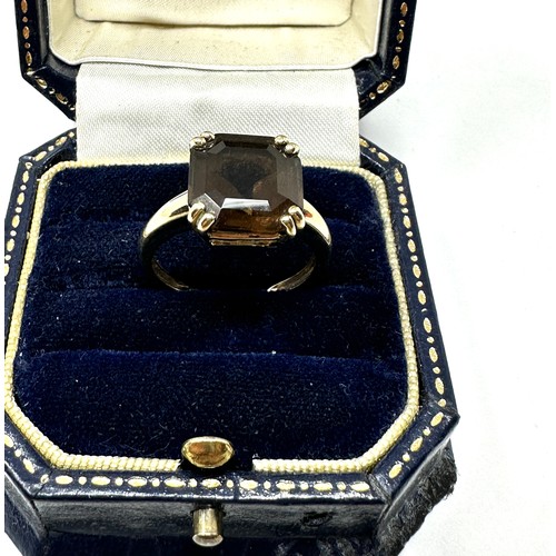 114 - 9ct gold smoky quartz ring (3.3g)