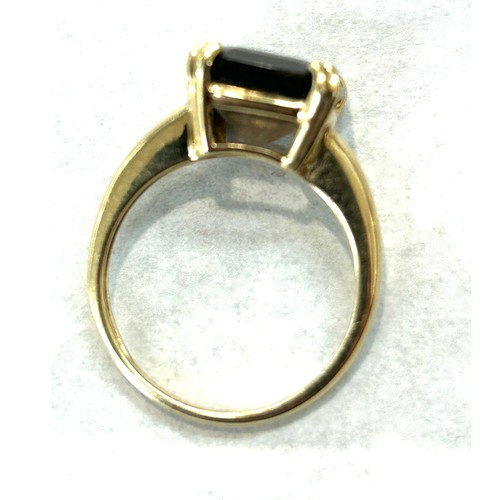 114 - 9ct gold smoky quartz ring (3.3g)