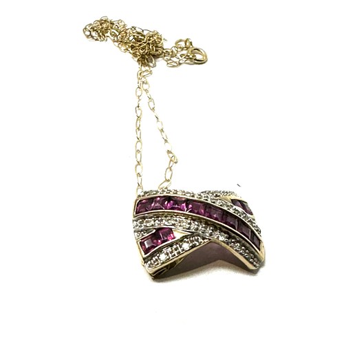 116 - 9ct gold diamond and garnet pendant necklace (2.6g)