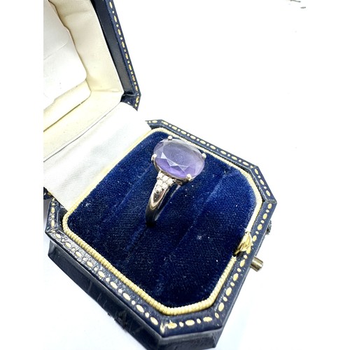 99 - 9ct white gold diamond and amethyst  ring (3.6g)