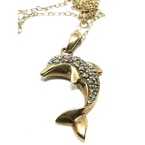 129 - 9ct gold diamond dolphin pendant necklace (2.4g)