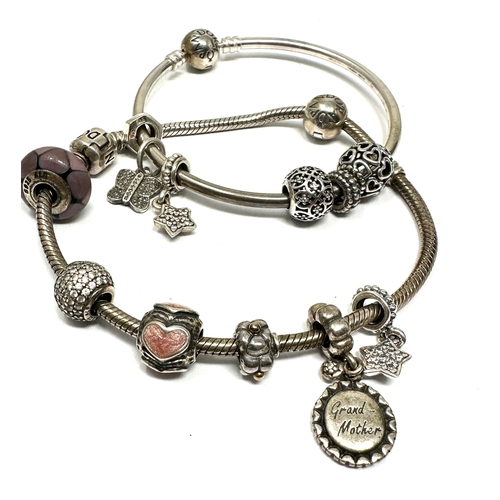 414 - 2 X .925 Bracelets And Assorted Charms By Pandora (67g)