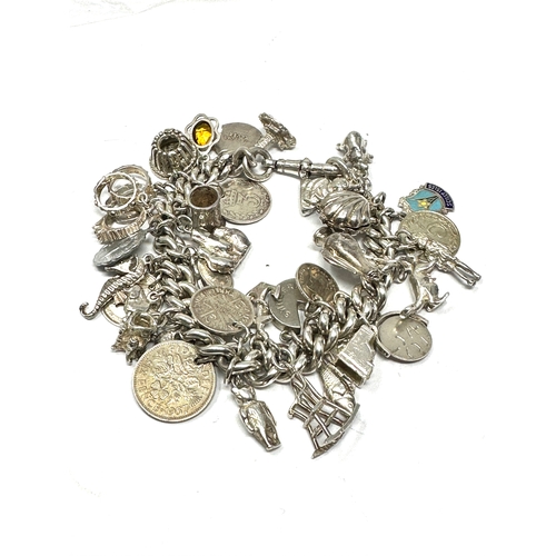 455 - A .925 Vintage Charm Bracelet With Assorted Novelty Charms (113g)