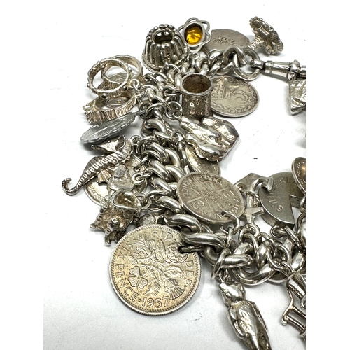 455 - A .925 Vintage Charm Bracelet With Assorted Novelty Charms (113g)