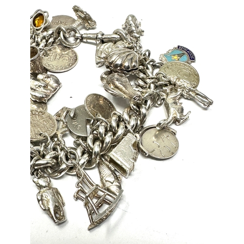 455 - A .925 Vintage Charm Bracelet With Assorted Novelty Charms (113g)