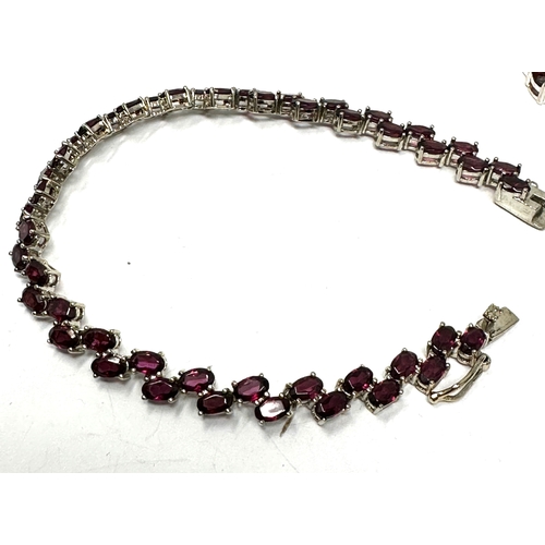 439 - 2 X .925 Stone Set Tennis Bracelets Including Garnet (32g)