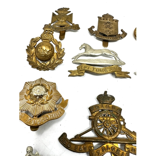 35 - 12 military cap badges inc lancashire fusiliers -essex reg .york etc