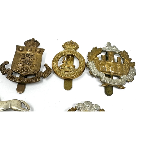 35 - 12 military cap badges inc lancashire fusiliers -essex reg .york etc