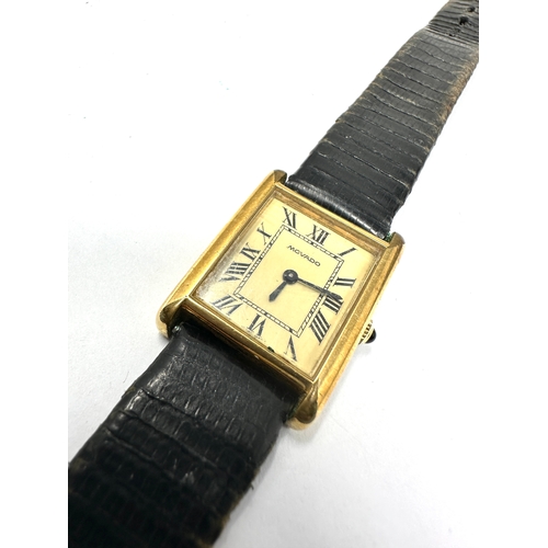 477 - Vintage gents Movado gold tone tank wrist watch hand winding the watch is ticking black leather stra... 